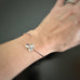 shamrock clover bracelet in sterling silver as shown on model